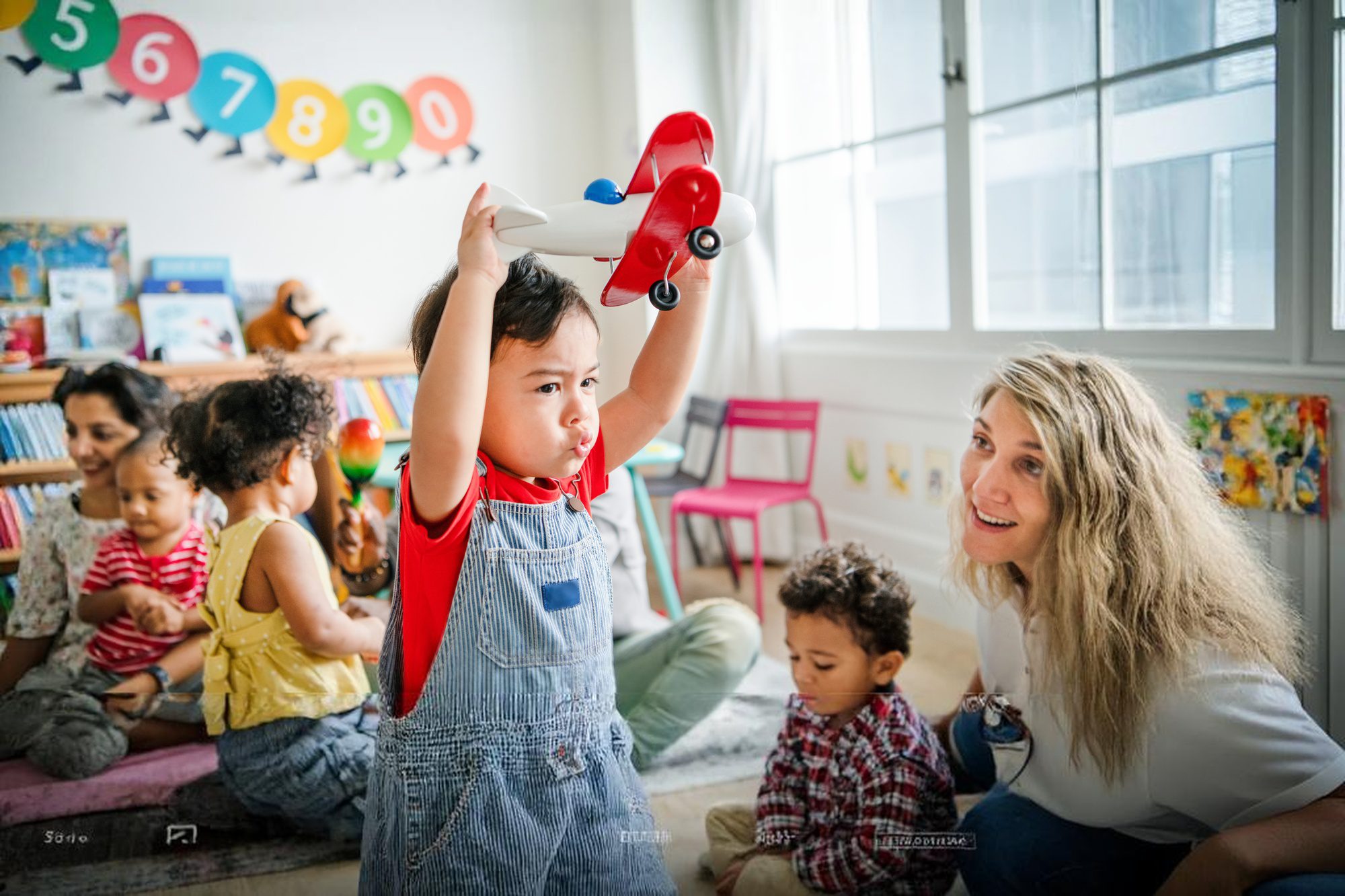 Young child playing in classroom